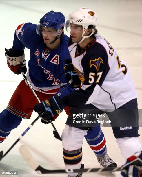 Tommy Pyatt of the New York Rangers locks up with Angelo Esposito of the Atlanta Thrashers during the 2008 NHL Prospects Tournament on September 14,...