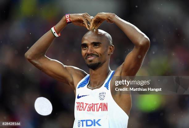 Mohamed Farah of Great Britain reacts by doing the mobot as he celebrates after competing in the Men's 5000 Metres heats during day six of the 16th...