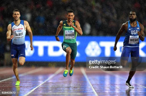 Daniel Talbot of Great Britain, Wayde van Niekerk of South Africa and Ameer Webb of the United States compete in the Men's 200 metres semi finals...