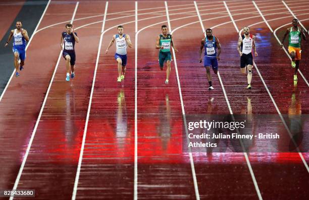 Daniel Talbot of Great Britain, Wayde van Niekerk of South Africa and Ameer Webb of the United States compete in the Men's 200 metres semi finals...