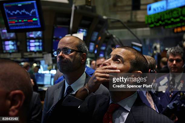 Traders work on of the floor of the New York Stock Exchange September 16, 2008 in New York City. The Federal Open Market Committee met today and...