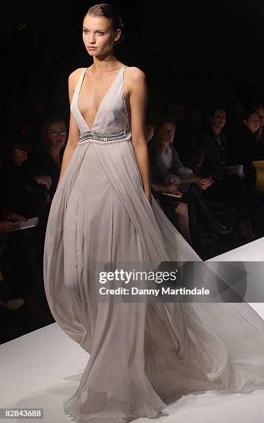 Model walks the runway at the Amanda Wakeley fashion show at the Natural History Museum on September 16, 2008 in London, England.