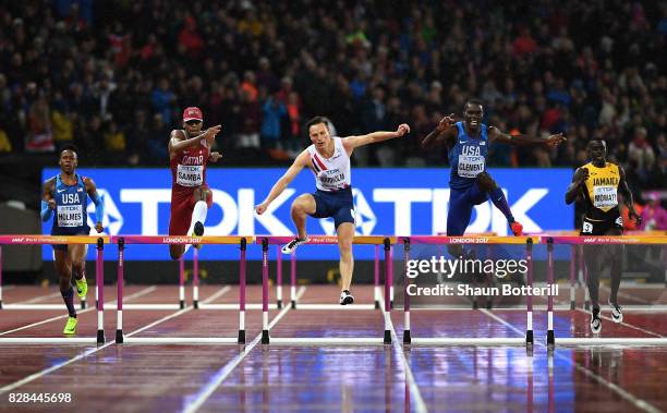 Holmes of the United States, Abderrahaman Samba of Qatar, Karsten Warholm of Norway and Kerron Clement of the United States compete in the Men's 400...