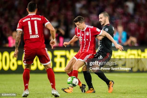 Bayern Munich Forward Robert Lewandowski fights for the ball with AC Milan Defender Leonardo Bonucci during the 2017 International Champions Cup...