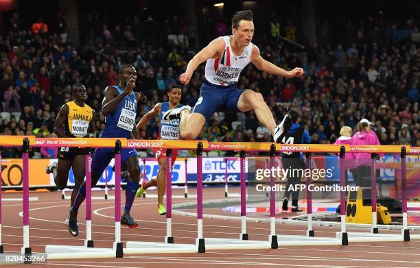 Jamaica's Kemar Mowatt, US athlete Kerron Clement and Norway's Karsten Warholm compete in the final of the men's 400m hurdles athletics event at the...