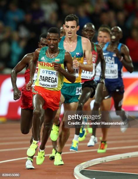 Selemon Barega of Ethiopia leads from Patrick Tiernan of Australia during heat two of the Men's 5000 Metres heats during day six of the 16th IAAF...