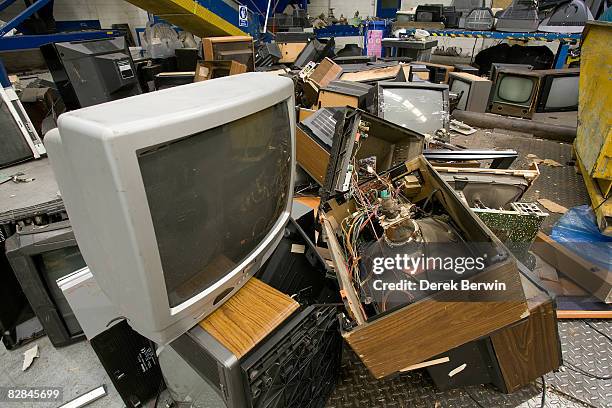 pile of discarded televisions - electrical equipment stock pictures, royalty-free photos & images