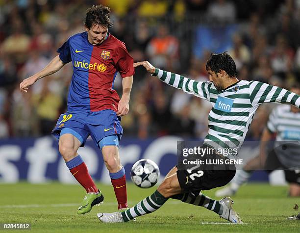 Barcelona's Argentinian Leo Messi vies with Sporting Lisboa's Marco Caneira during a Champions League Group C football match at the Camp Nou stadium...