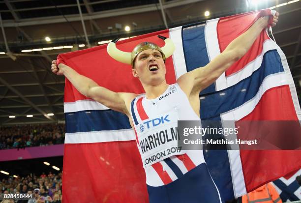 Karsten Warholm of Norway celebrates after winning gold in the Men's 400 metres hurdles final during day six of the 16th IAAF World Athletics...