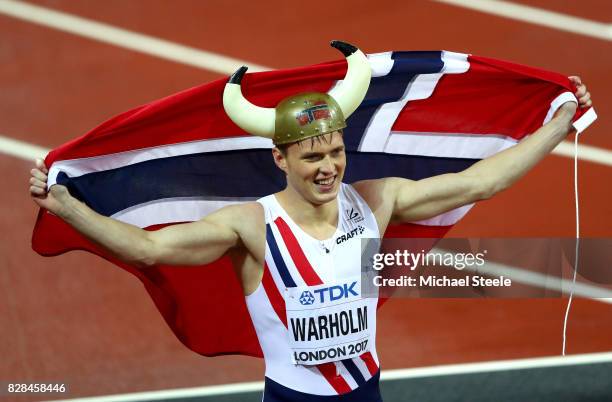 Karsten Warholm of Norway celebrates after winning gold in the Men's 400 metres hurdles final during day six of the 16th IAAF World Athletics...