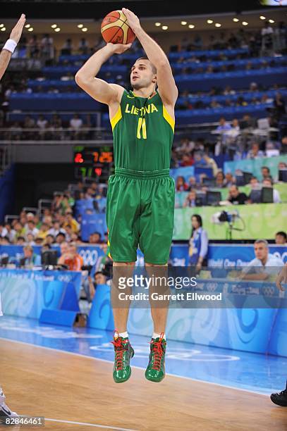 Lines Kleiza of Lithuania shoots a jump shot during a game against Spain in the Men's Basketball Semifinals at the 2008 Beijing Summer Olympics on...