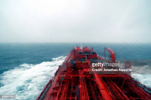The Jo Cedar tanker isheading to the US coast through a storm, on July 13 in France. The tanker will unload its NAFTA in the port of Philadelphia.