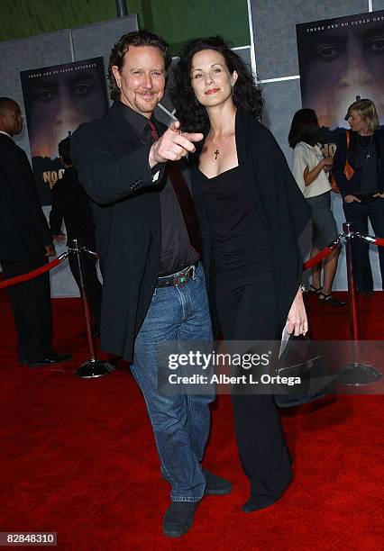 Actor Judge Reinhold and wife Amy arrive at the Miramax Films' Los Angeles Premiere of "No Country For Old Men" at the El Capitan Theater in...