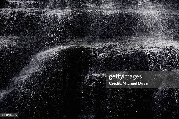 waterfall close up - frozen waterfall stock-fotos und bilder