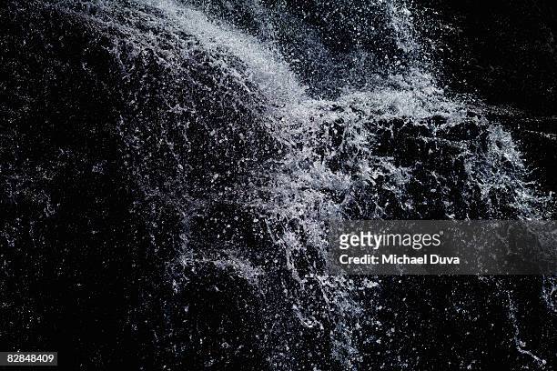 waterfall close up - frozen waterfall stock-fotos und bilder