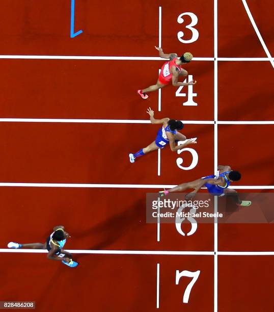 Phyllis Francis of the United States, Salwa Eid Naser of Bahrain and Allyson Felix of the United States cross the finish line ahead of Shaunae...