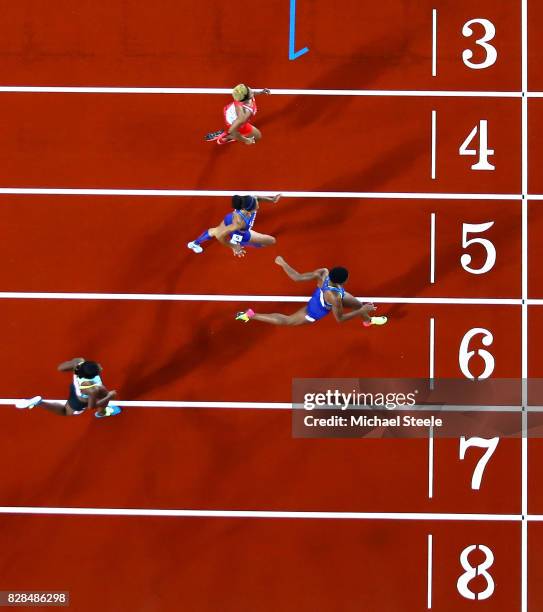 Phyllis Francis of the United States, Salwa Eid Naser of Bahrain and Allyson Felix of the United States race to the finish line ahead of Shaunae...