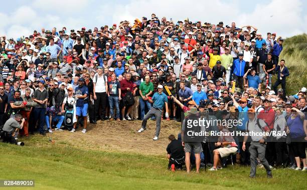 Jordan Spieth of the United States plays from the crowd on the 6th hole during the final round of the 146th Open Championship at Royal Birkdale on...