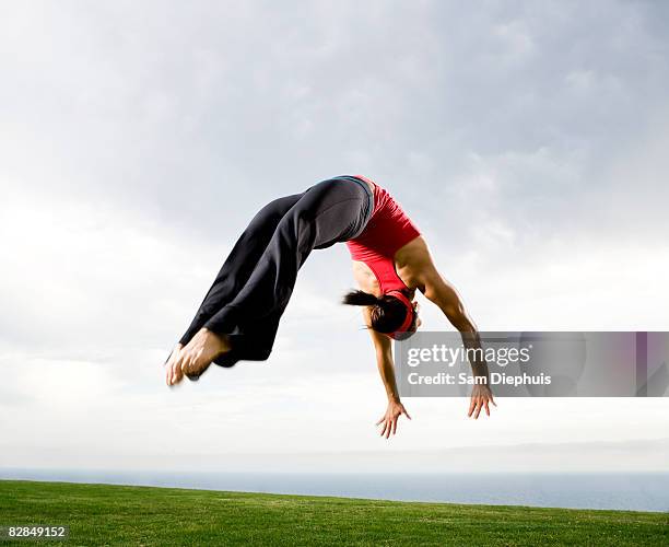 acrobats and contortionists - acrobatic activity photos et images de collection