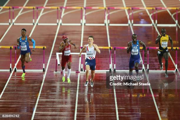 Karsten Warholm of Norway and Kerron Clement of the United States compete in the Men's 400 metres hurdles during day six of the 16th IAAF World...