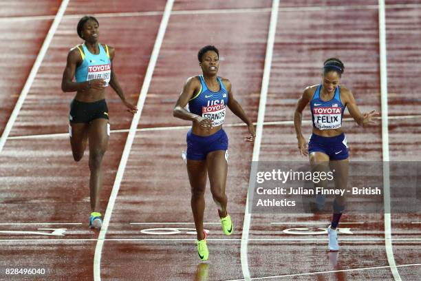 Phyllis Francis of the United States and Allyson Felix of the United States cross the finish line ahead of Shaunae Miller-Uibo of the Bahamas in the...