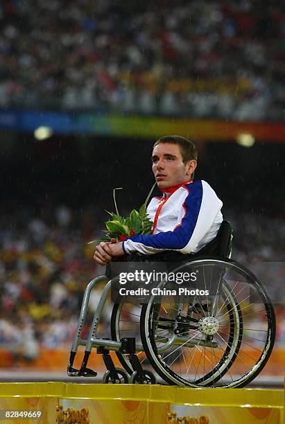 Mickey Bushell of Great Britain is shown after winning the silver medal in the Men's 100m - T53 Final Athletics event at the National Stadium during...