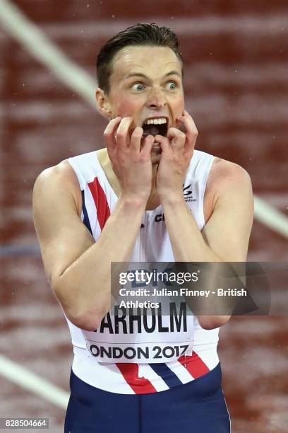 Karsten Warholm of Norway celebrates after winning gold in the Men's 400 metres hurdles final during day six of the 16th IAAF World Athletics...