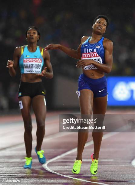 Phyllis Francis of the United States and Shaunae Miller-Uibo of the Bahamas wait for resuts in the Women's 400 metres final during day six of the...