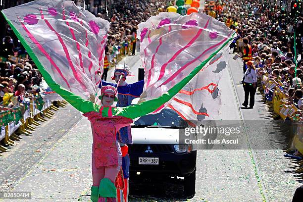 Performers walk in a welcome home parade for the Beijing 2008 Olympic athletes at Federation Square September 17, 2008 in Melbourne, Australia....
