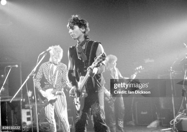 Johnny Thunders performing on stage at Lyceum Theatre, London 9 October 1983.