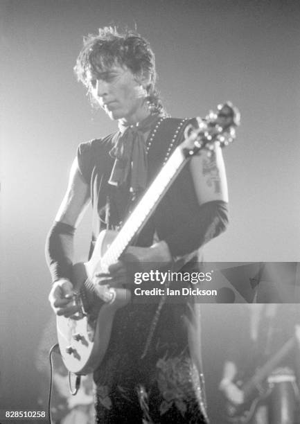 Johnny Thunders performing on stage at Lyceum Theatre, London 9 October 1983.