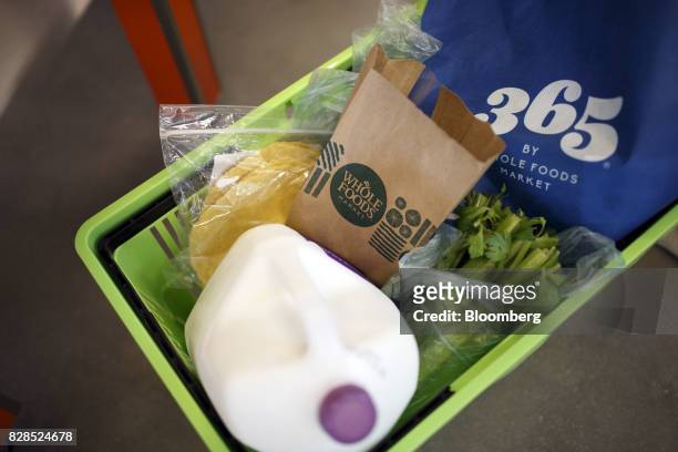 Basket of groceries is seen during the grand opening of a Whole Foods Market 365 location in Santa Monica, California, U.S., on Wednesday, Aug. 9,...