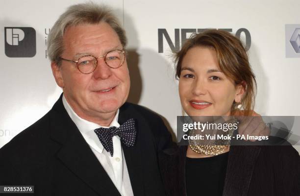 Director Alan Parker and his wife Lisa arrive for the 50th anniversary gala of the NFT at the National Film Theatre on the South Bank in London.