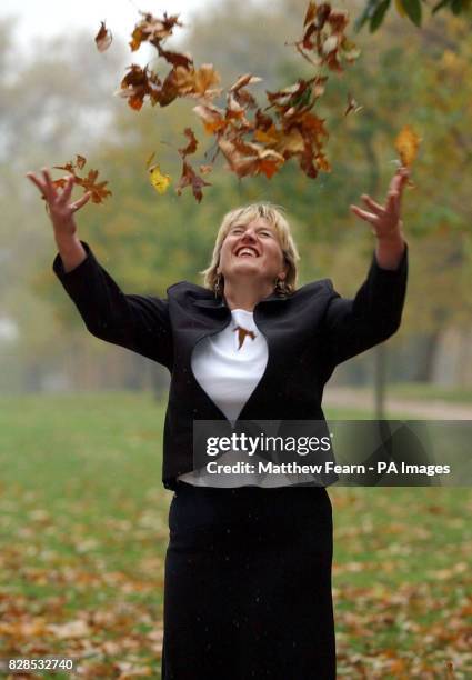 Children's Community Learning Disability Nurse Stacey Atkinson, sits in London's Hyde Park, after winning the 2002 Nursing Standard Nurse of the Year...