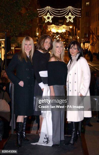 Classical music string quartet Bond Tania Davis, Haylie Ecker, Eos Chater and Gay-Yee Westerhoff after turning on the Bond Street Christmas lights in...