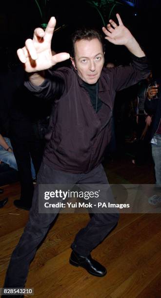 Musician Joe Strummer arriving for the The Dian Fossey Gorilla Fund rock concert at the Royal Opera House in London's Covent Garden, to mark the...