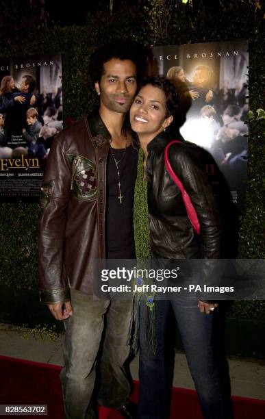 Actress Halle Berry and her husband Eric Benet arrive at the Goldwyn Theatre, Beverly Hills for the premiere of Evelyn. 02/10/03: Berry has announced...