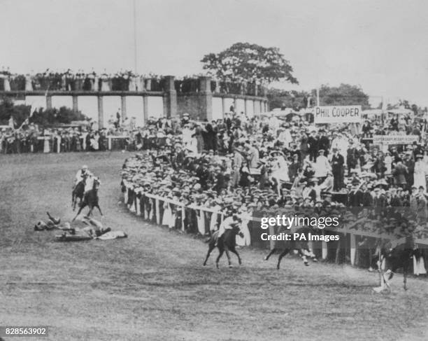 Suffragette Emily Davison throwing herself under the King George V's horse Anmer at the Epsom Derby.