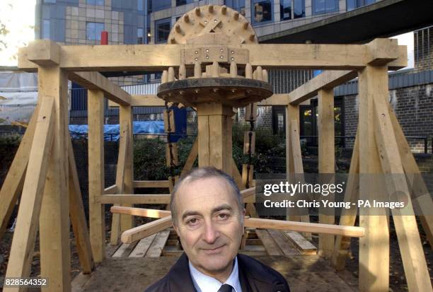 Actor Tony Robinson from the archaeological television programme Time Team, in front of a 12ft replica of a Roman water lifting machine, at the...