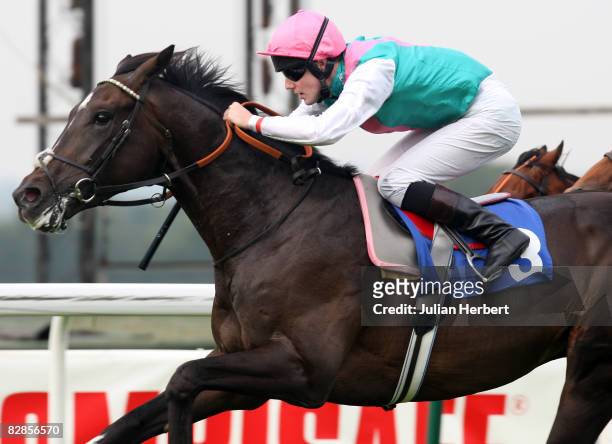 Tom Queally and Wingwalker land the Combisafe Novice Stakes Race run at Sandown Racecourse on September 17 in Esher, England.