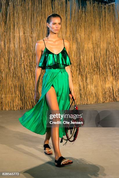 Model walks the runway at the 'By Malene Birger' show during the Copenhagen Fashion Week Spring/Summer 2018 on August 9, 2017 in Copenhagen, Denmark.