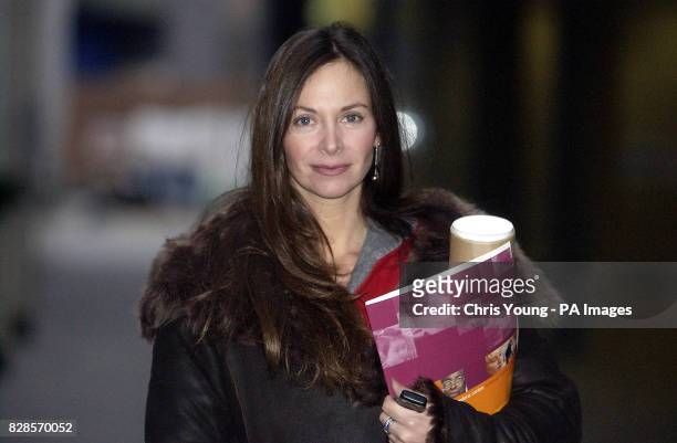 Carole Caplin arrives for work in central London. Ms Caplin, a friend of the Prime Minister's wife Cherie Blair, has been caught in the furore...