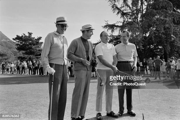 View of, from left, American actors James Stewart and Fred MacMurray , British-born American actor Bob Hope , and US President Richard Nixon as they...
