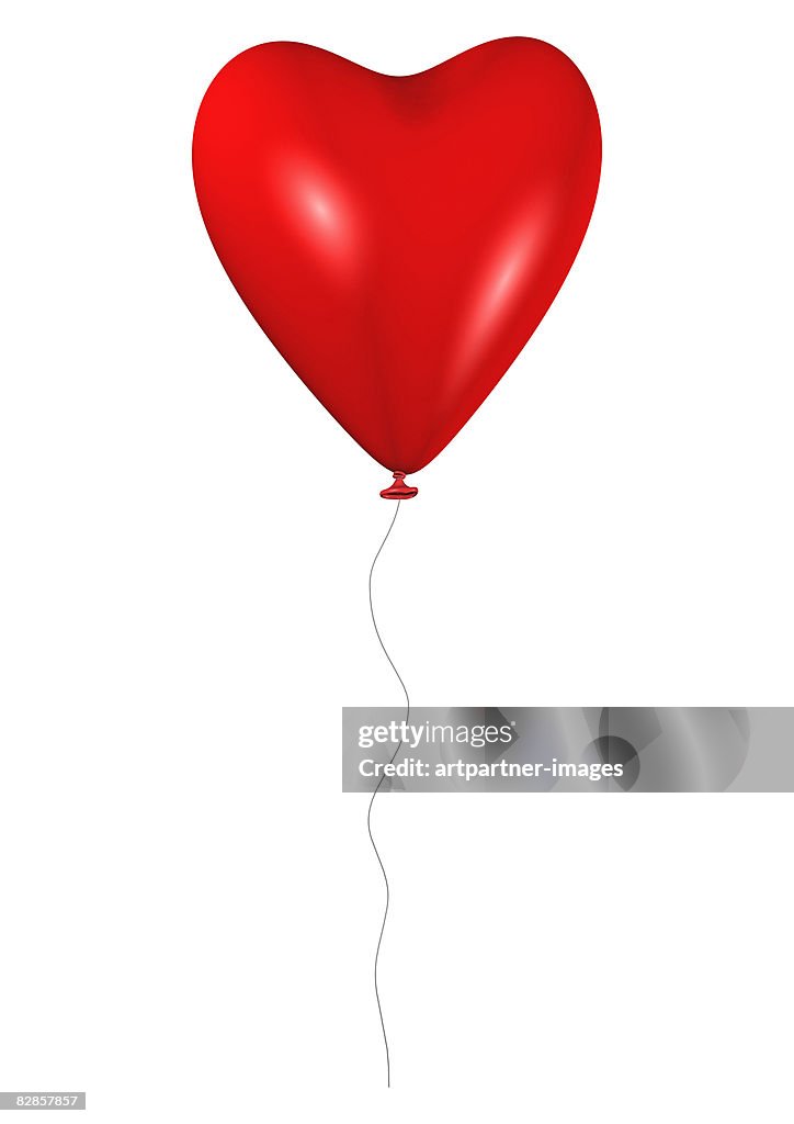 Red heart balloon with cord flies on white 