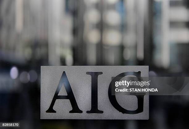 Logo of troubled insurer American International Group Inc. September 17, 2008 on a window at their office in the lower Manhattan area of New York.The...