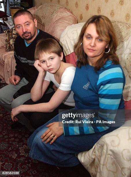 Kristopher King with parents Mick and Dianne at home in Spondon, Derby who are suing education bosses after youths repeatedly kicked and beat...