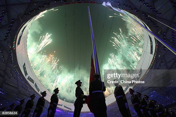 Fireworks explode during the closing ceremony of the 2008 Beijing Paralympic Games at the National Stadium on September 17, 2008 in Beijing, China.