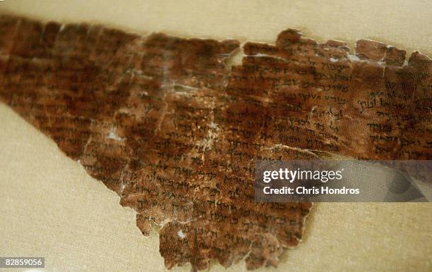 Two thousand-year-old fragment of the The Words of the Luminaries from the Dead Sea Scrolls is seen on display at The Jewish Museum September 17,...