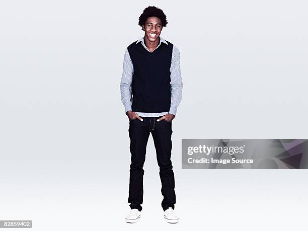 portrait of a young man - black trousers stockfoto's en -beelden