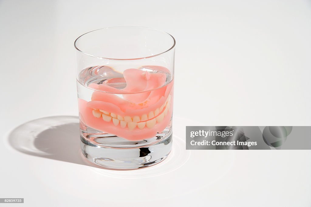 Dentures in a glass of water
